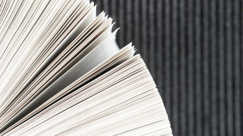 close-up-book-pages-with-black-background close-up-book-pages-with-black-background